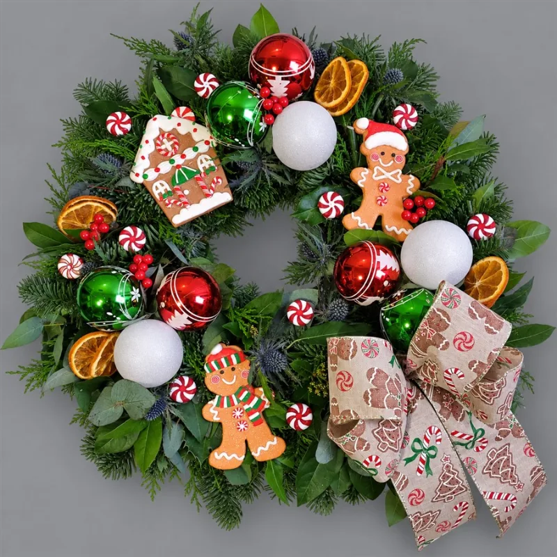 Gingerbread Wreath — A festive favourite that smells as good as it looks! This natural moss-based wreath is handcrafted w