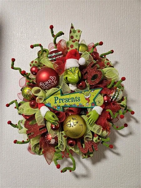 Bespoke Artificial Grinch inspired Wreath — Bring a touch of mischievous Christmas magic to your home with this vibrant artificial Grinch wreath