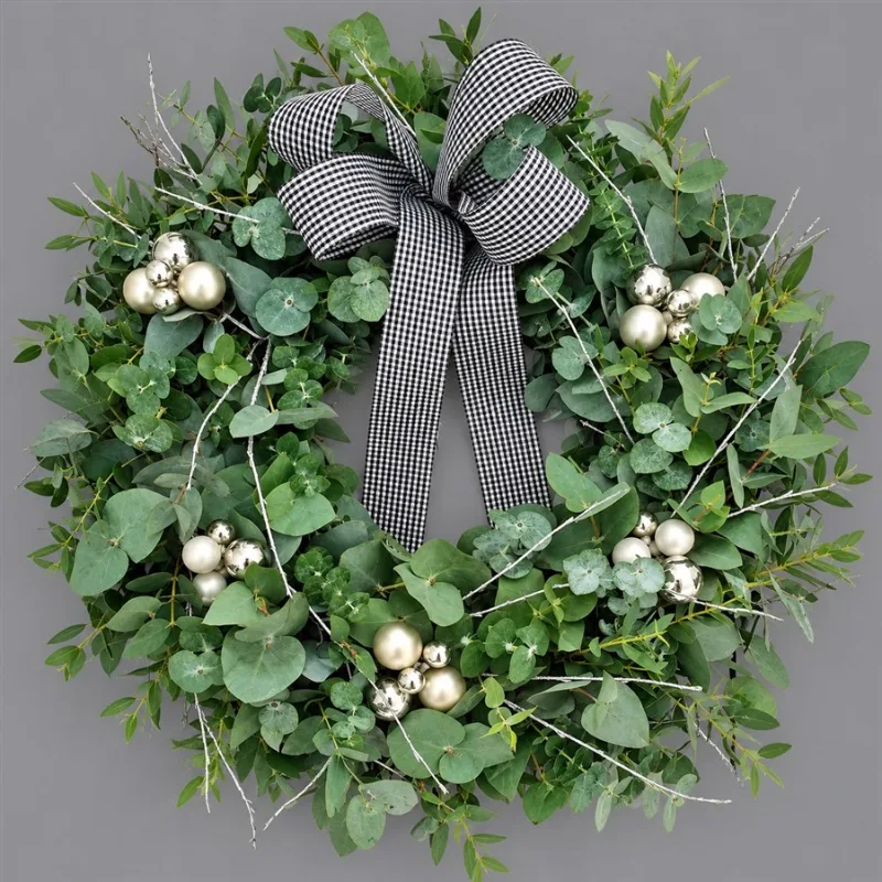 Natural Wreath — A beautifully handcrafted wreath combining the rich textures and tones of blue spruce, conifer, euca