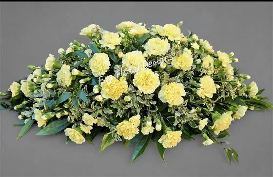 Carnation Casket Spray — Casket spray of large headed carnations, spray carnations and mixed foliages, available in different