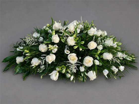 Delicate Rose & Lisianthus Casket Spray — Large headed roses and beautiful delicate lisianthus with textured foliages to create this classic b