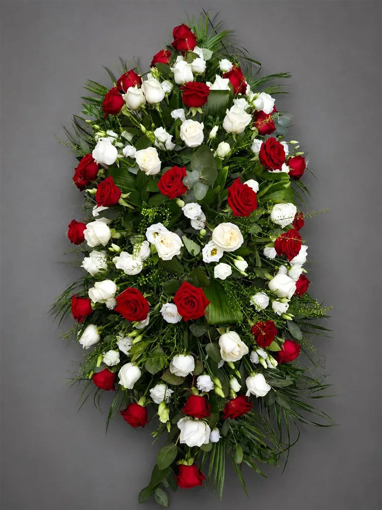 Red & White Rose Mixed Casket Spray — A red rose casket spray is a floral arrangement typically placed on top of a casket during a funeral