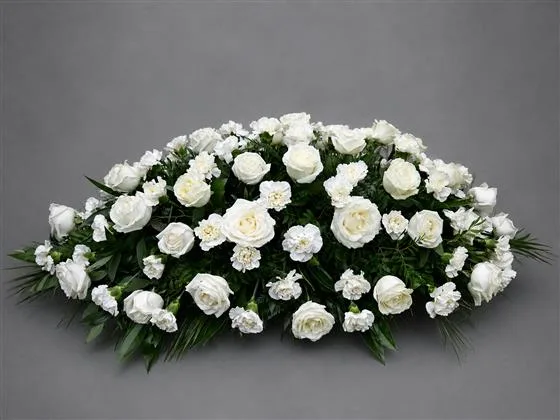 Rose & Carnation Casket Arrangement — Large headed roses combined with carnations and luxurious foliages to create this traditional casket