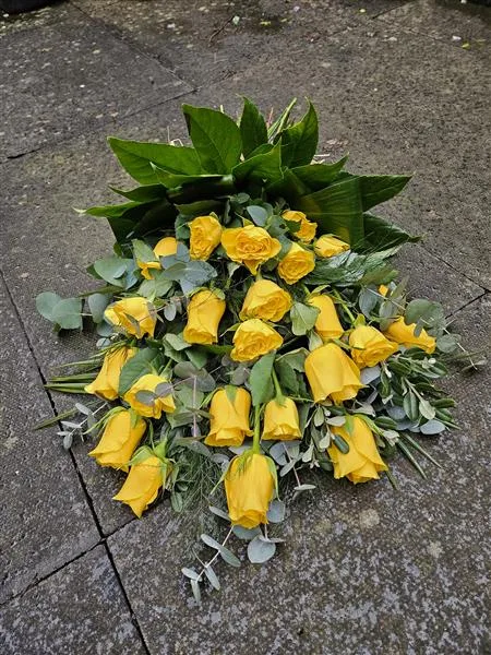 24 Single Yellow Roses Tied Sheaf — Yellow Roses tied sheaf, long stemmed roses, with complementary foliage finished with a raffia bow.