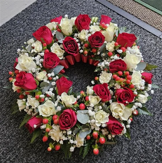 Red & White Rose Wreath — 12" red and white mixed rose wreath, with gypsophila and mixed seasonal foliage makes this a beautif