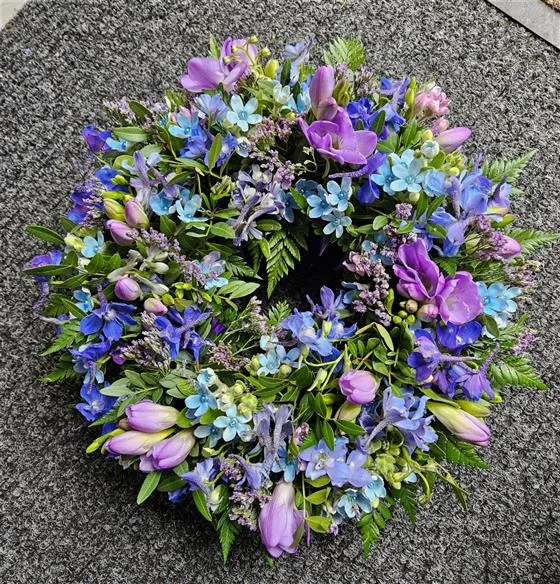 Purple Mixed Funeral Wreath — Mixed flower wreaths also available in any colour of your choosing and different sizes. Our picture 