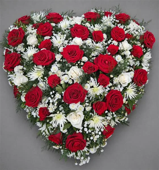 Delicate Mixed Flower Heart — Red luxury roses with delicate flowers arranged in a loose style heart shaped sympathy tribute Pleas