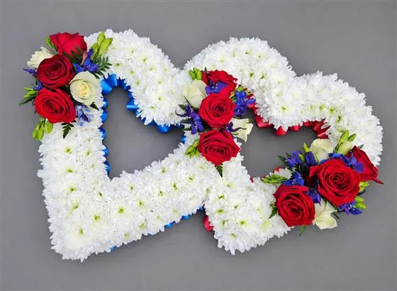 Double Based Heart — A beautiful double heart available in 2 sizes, made with based white chrysanthemums, ribbon edging i