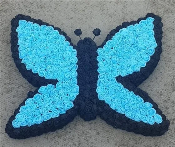 Butterfly - Artificial — Also available in fresh flowers - Please call 0114 273 7689 for a price. Please allow 2 working days