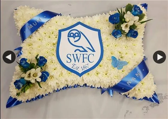 SWFC Pillow — A pillow tribute based in white chrysanthemums with the Sheffield Wednesday badge at the centre, spr