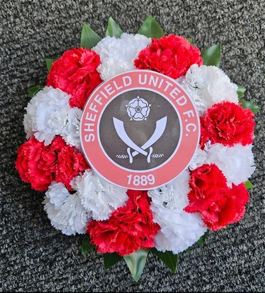 SUFC Football Artificial Posy — An artificial floral posy is a thoughtful and lasting tribute for a funeral, often used to express d