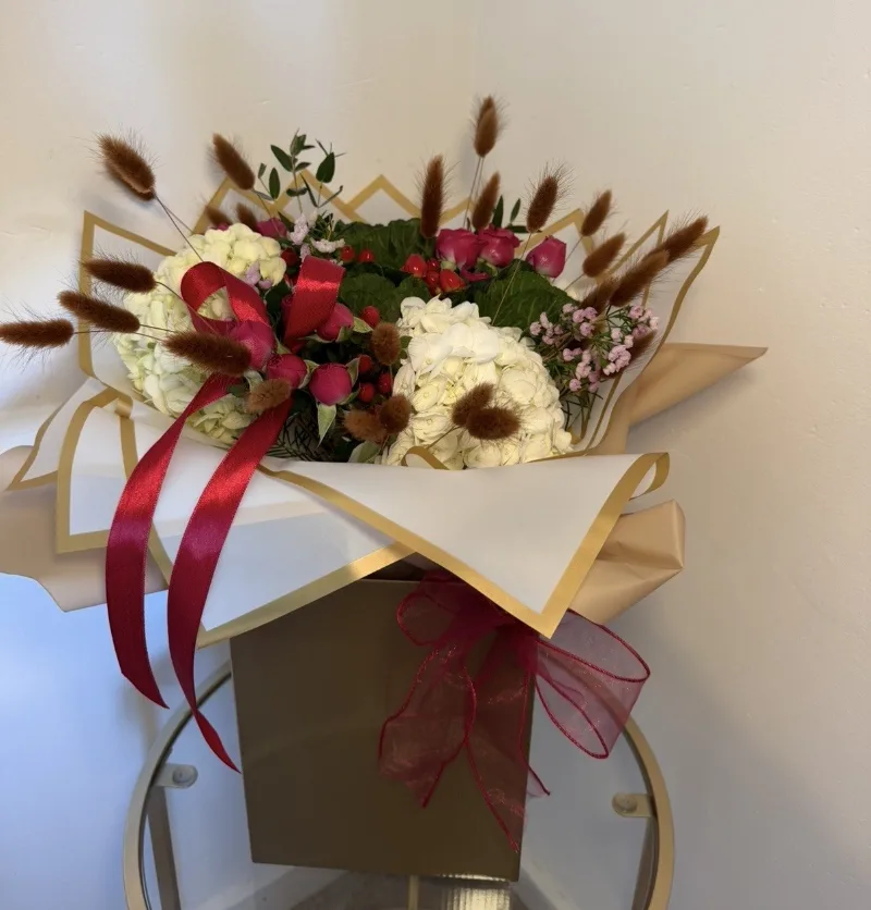 The 'Ber' Bouquet — Inspired by the beauty of the ‘ber’ months, this seasonal bouquet brings together rich autumnal tone
