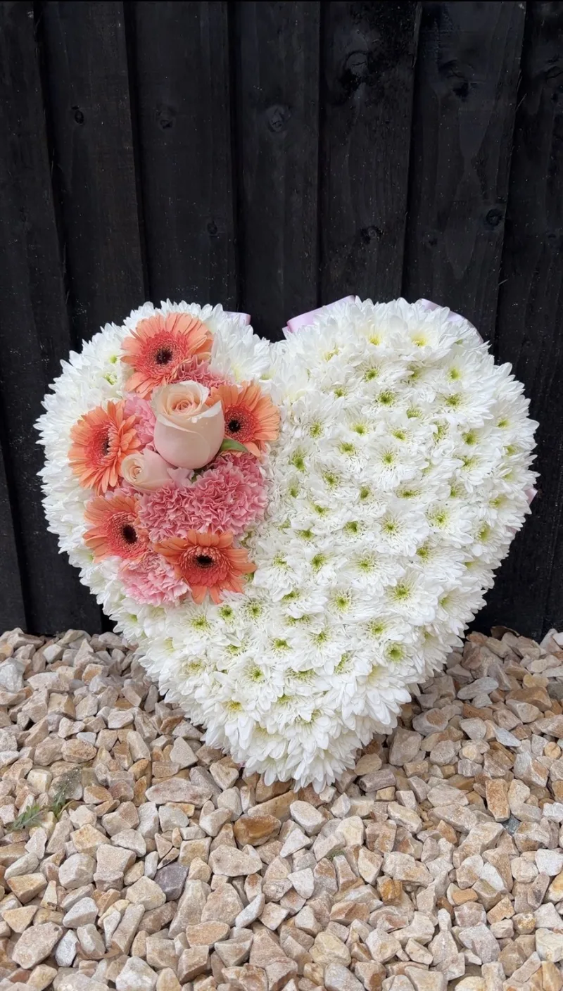The Cherished Heart — A beautiful heart-shaped funeral tribute, lovingly handcrafted with a full base of fresh white chrys
