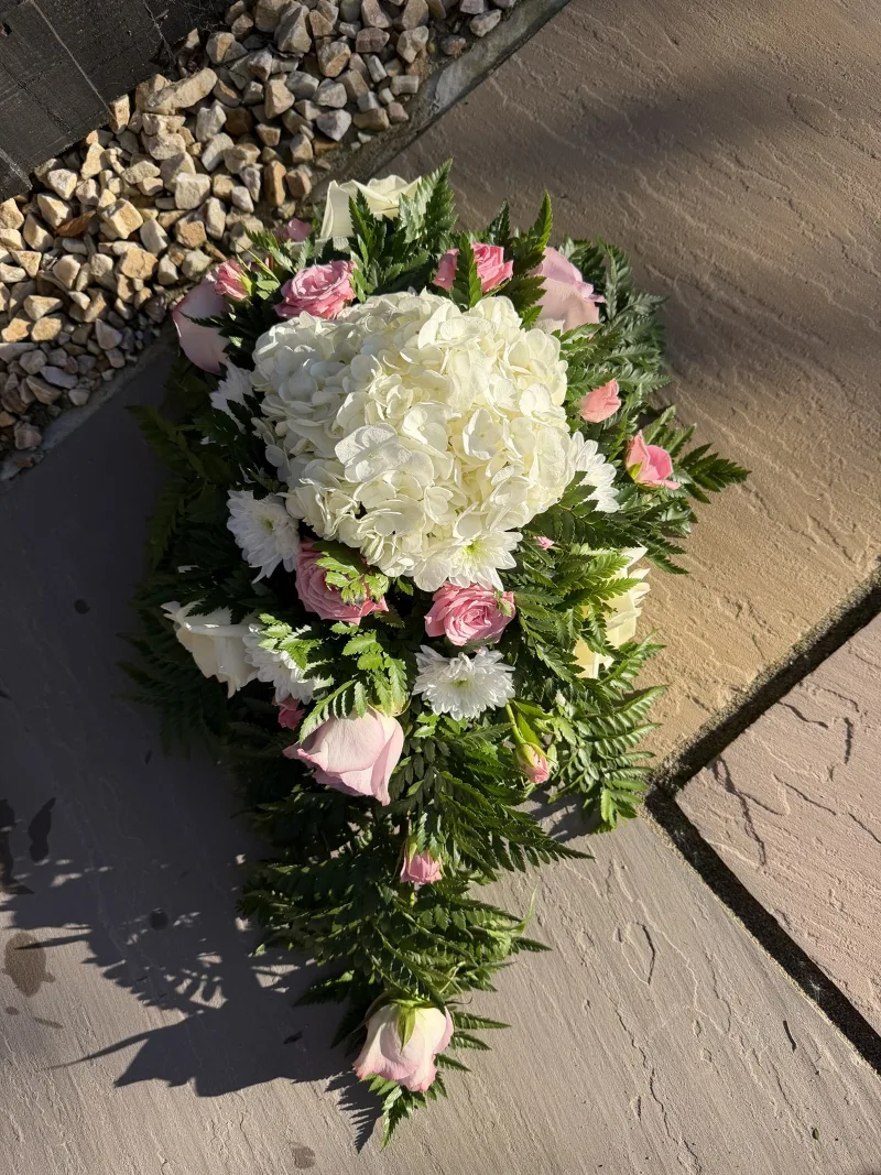 The Single-Ended Floral Spray — A graceful expression of love and remembrance. This elegant, single-ended tribute combines romantic 