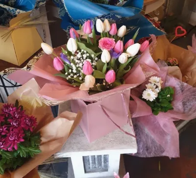 The Blush — Soft pink and white tulips with gypsophila, wrapped in blush pink.