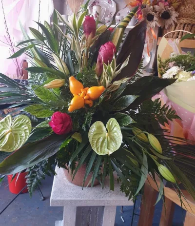 The Tropical — Anthurium, protea and exotic tropical foliage for a striking display.